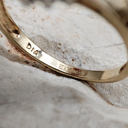 Amethyst and diamond halo ring in 9K gold