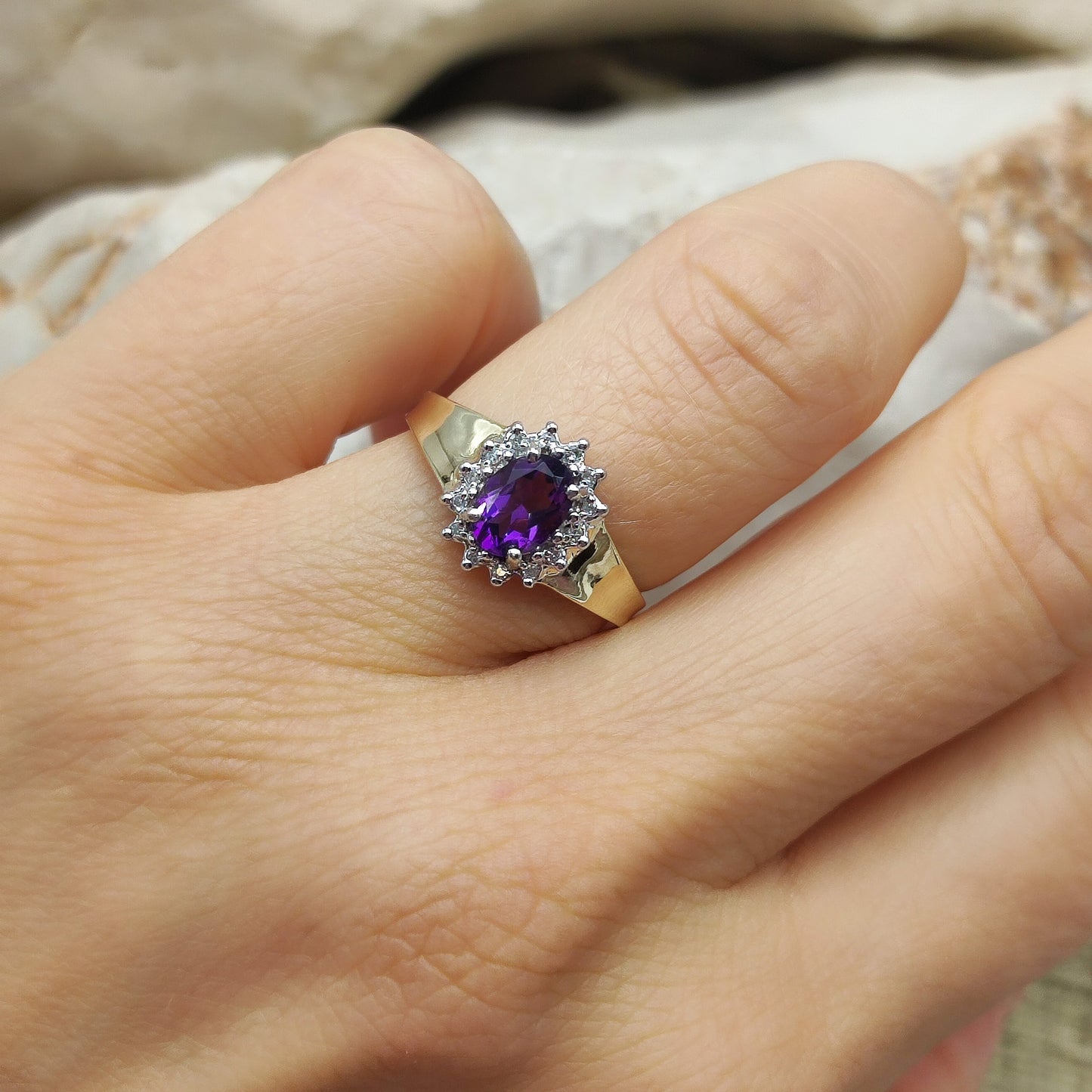 Amethyst and diamond halo ring in 9K gold