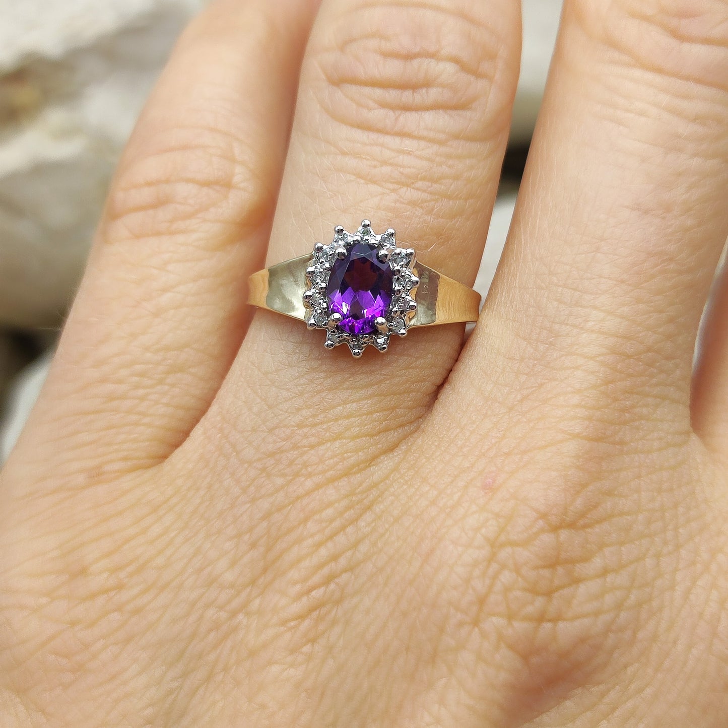 Amethyst and diamond halo ring in 9K gold