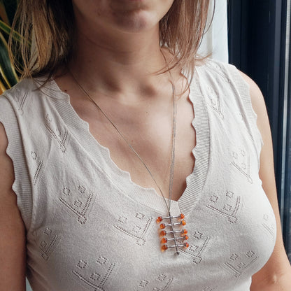 Modernist kinetic amber necklace 1970s silver