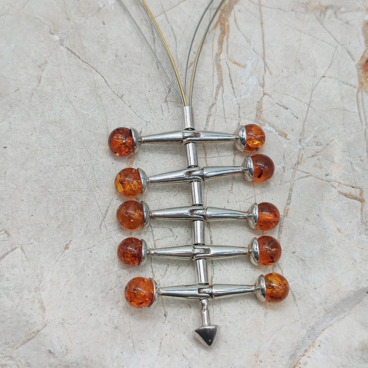 Modernist kinetic amber necklace 1970s silver