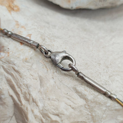 Modernist kinetic amber necklace 1970s silver