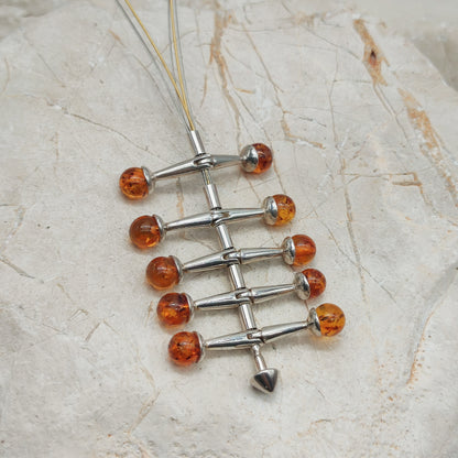 Modernist kinetic amber necklace 1970s silver