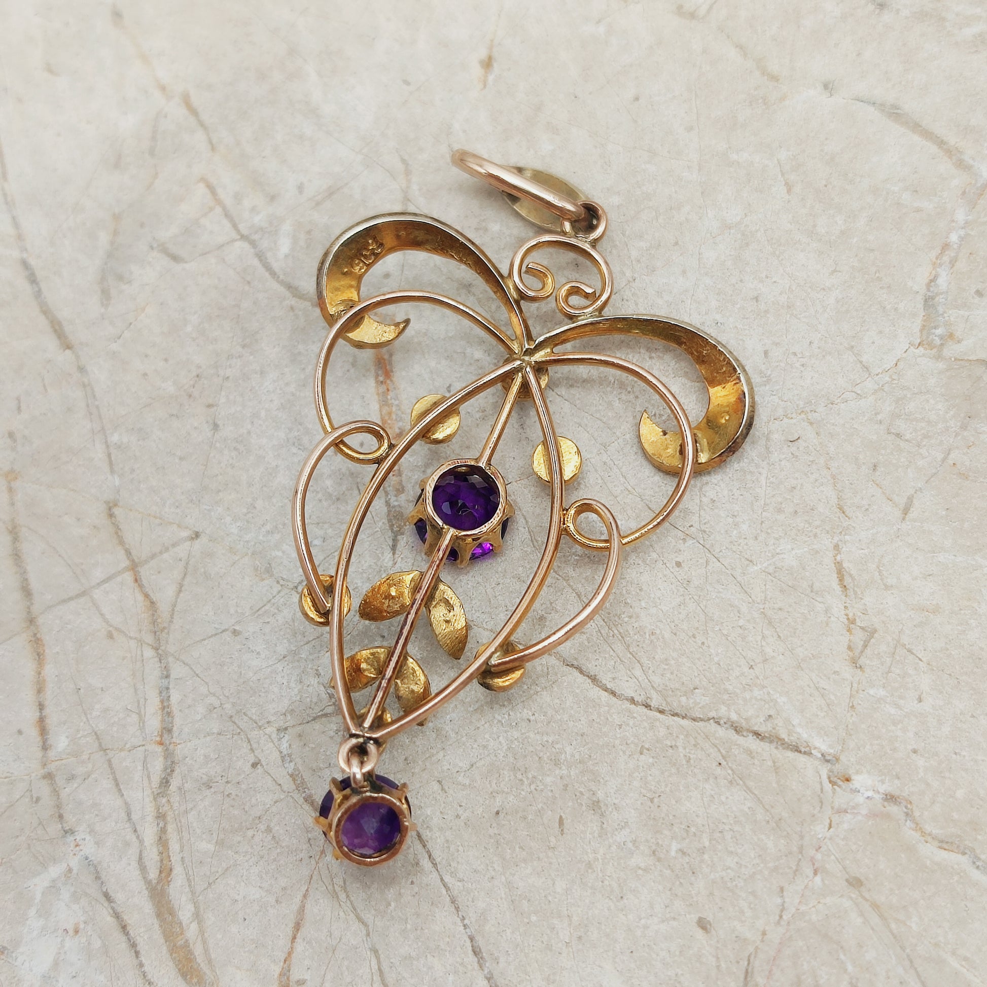 Back of antique Edwardian lavaliere pendant stamped 9CT.