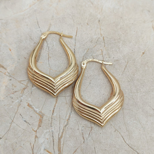 Vintage 9 karaat gouden creolen van UnoAErre met sculpturaal ontwerp