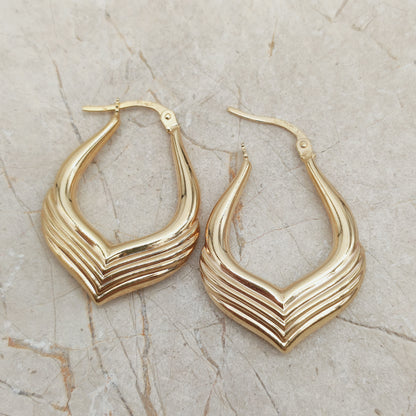 Vintage Italiaanse gouden creolen met geïntegreerde sluiting