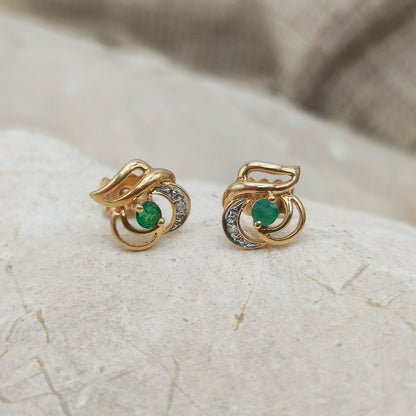 Vintage 18ct gold earrings with emerald centre stone