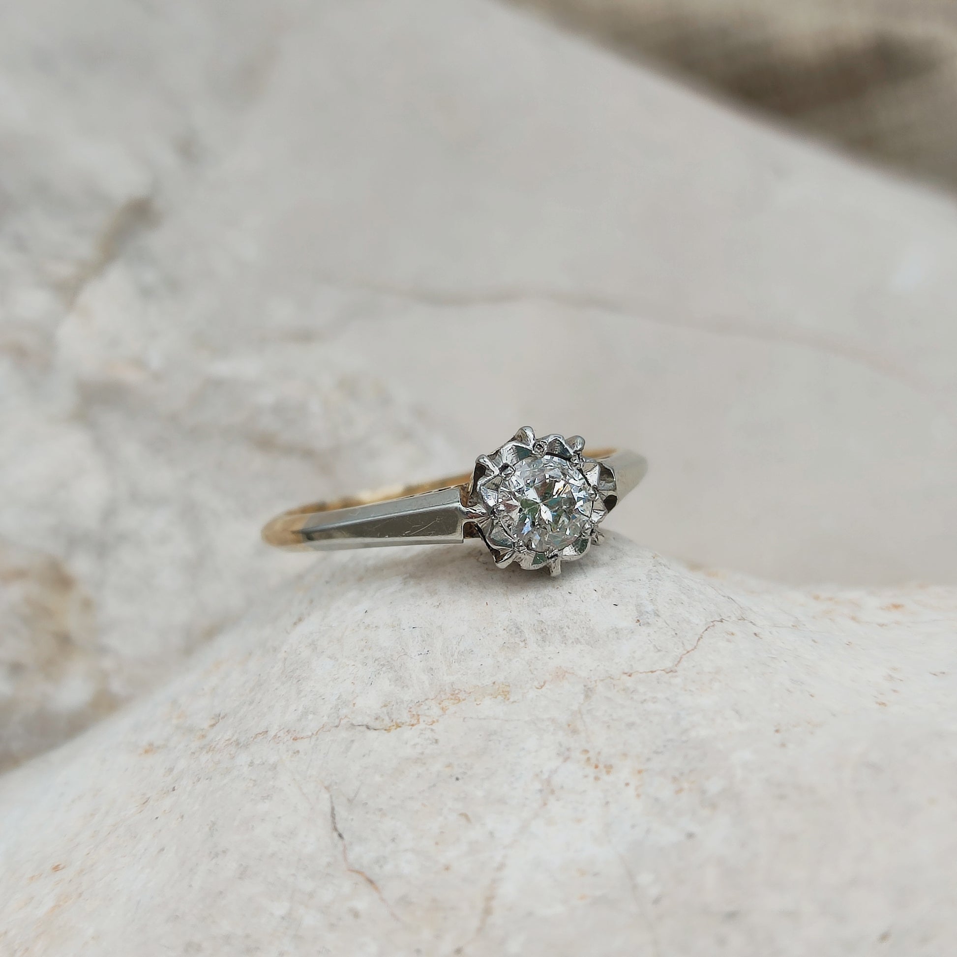 Vintage diamond solitaire ring in 18k gold and platinum front view