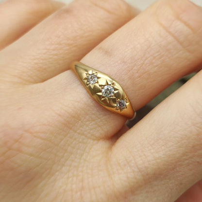 vintage gypsy diamond ring worn on finger showing star setting