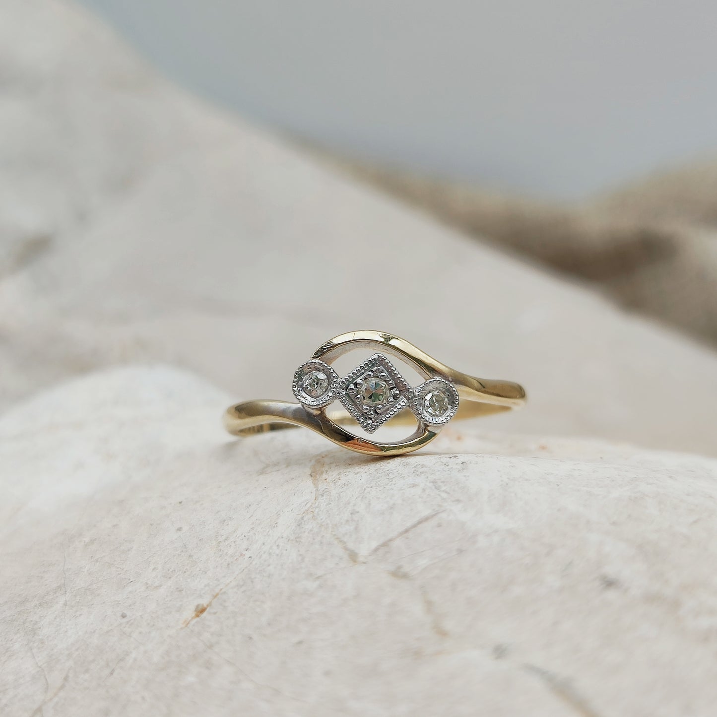 Edwardian diamond crossover ring with platinum setting