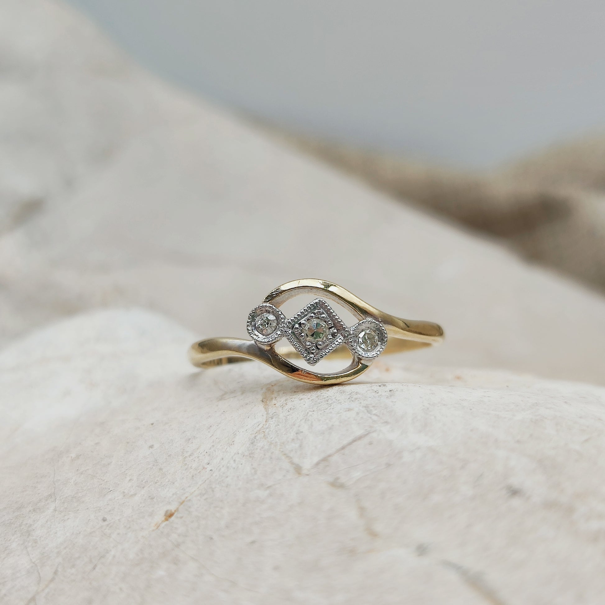 Edwardian diamond crossover ring with platinum setting