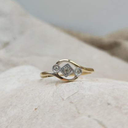 Edwardian diamond crossover ring with platinum setting
