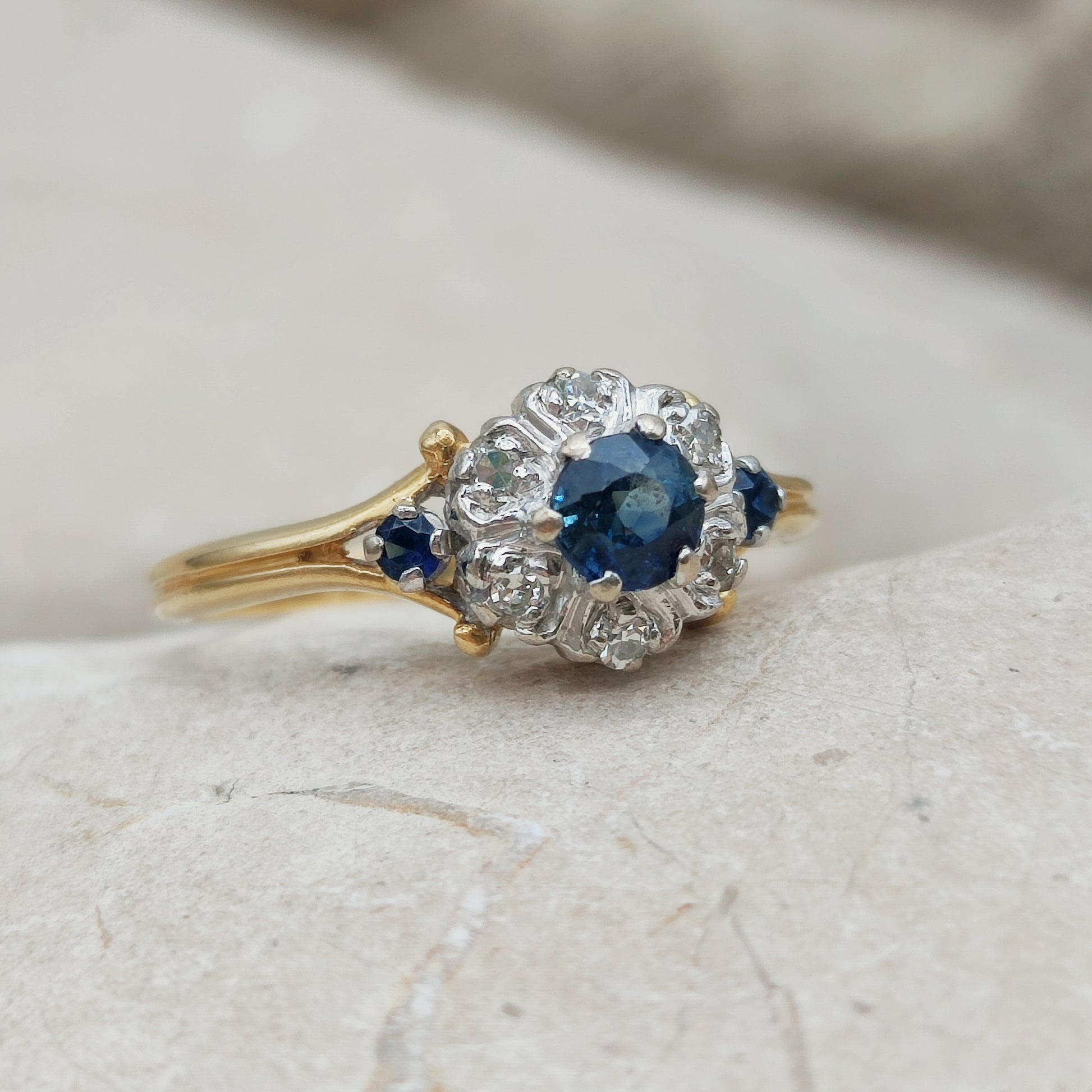 Vintage sapphire diamond ring side profile showing gold band