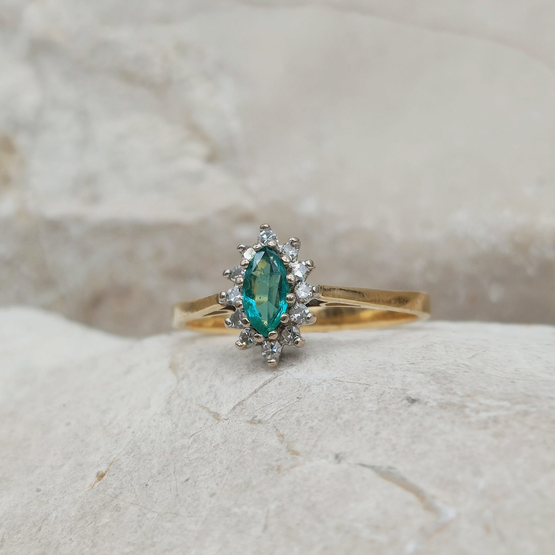 Marquise emerald ring with diamond halo vintage 18ct gold