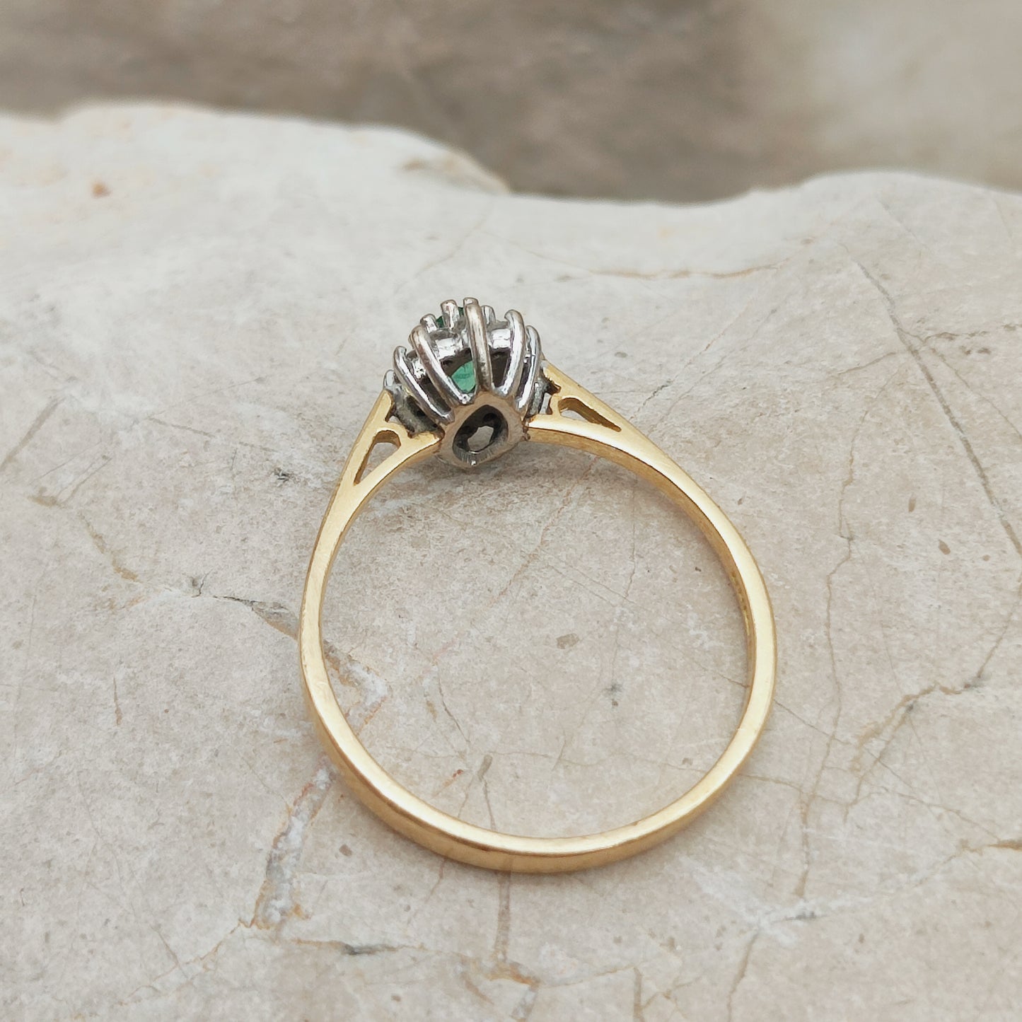 Side view emerald diamond ring white gold setting