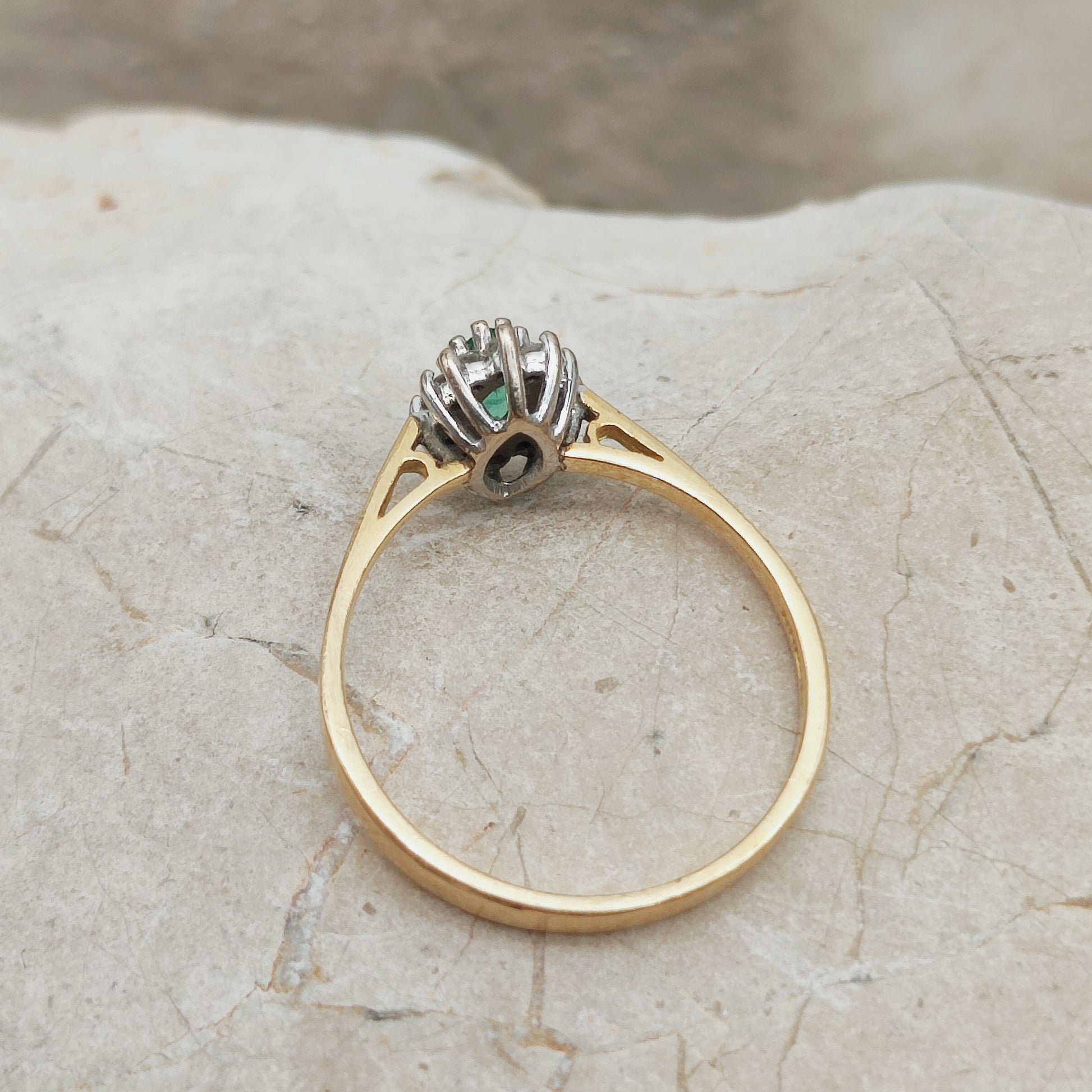 Side view emerald diamond ring white gold setting