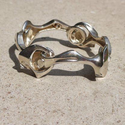 Vintage zilveren Lapponia Kang’s Chain armband van Björn Weckström op lichte stenen ondergrond