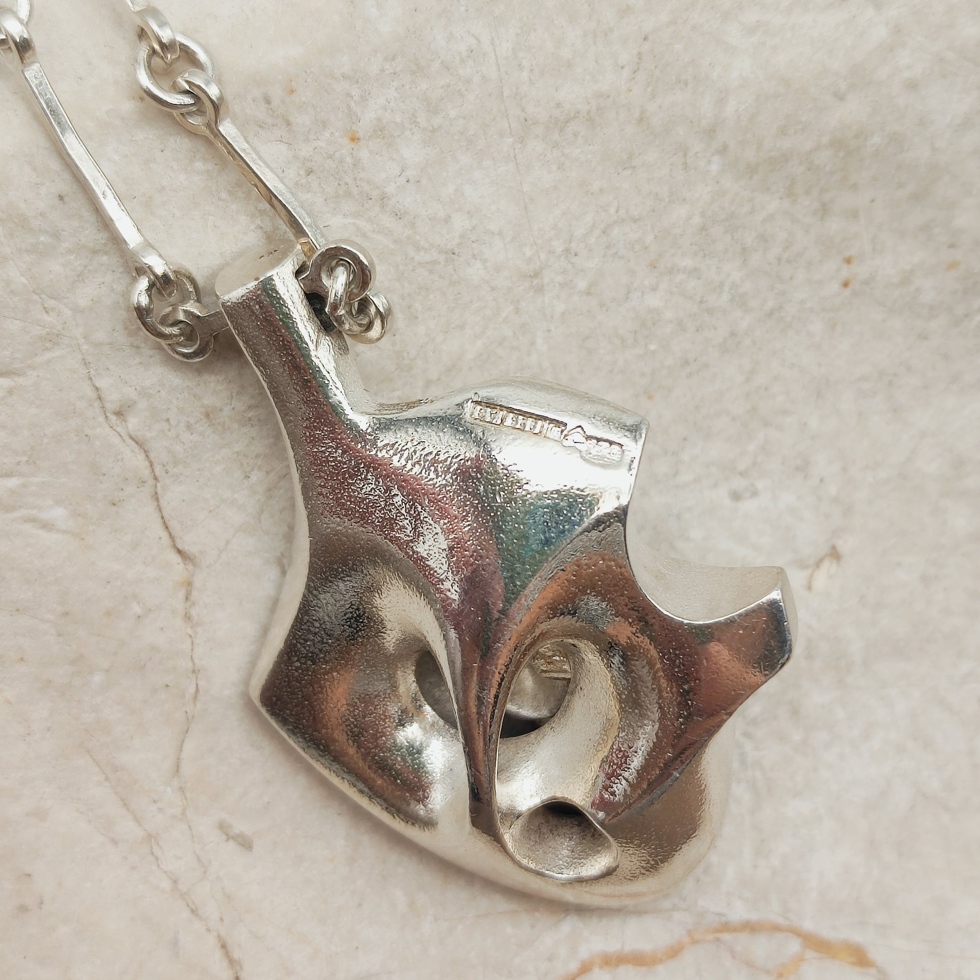 Reverse of the Lapponia Auriga pendant with Finnish silver hallmarks
