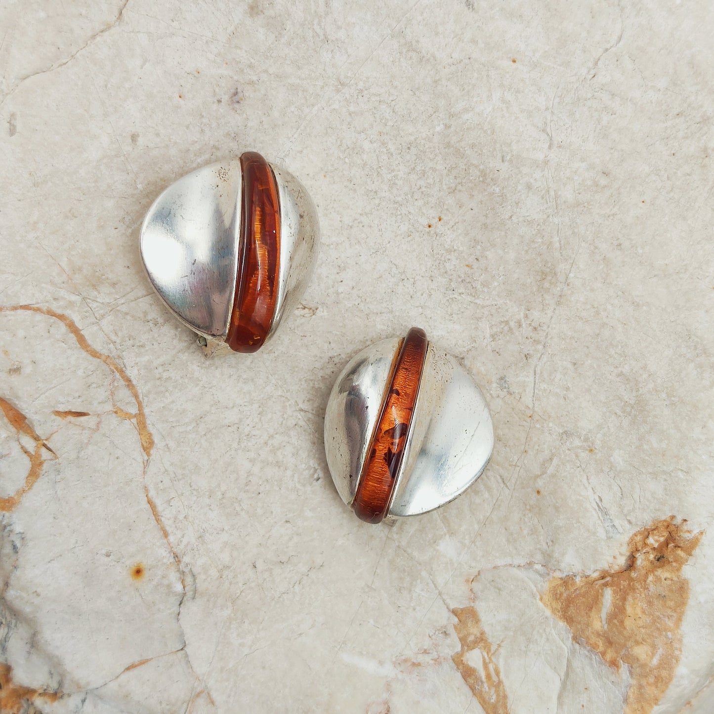 Sculptural Lapponia sterling silver clip-on earrings by Poul Havgaard with curved amber details