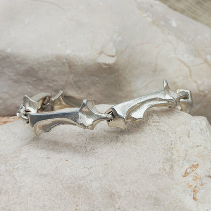 Vintage Lapponia Spica-armband in sterling zilver uit 1990, ontworpen door Björn Weckström, met gebogen organische schakels en geïntegreerde sluiting.